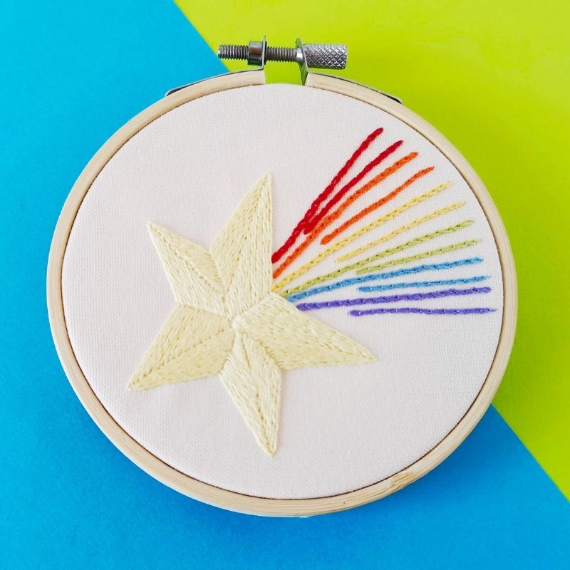 Rainbow star hand embroidered picture framed in a hoop