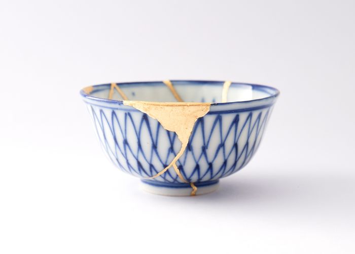 Hand embroidery for mending: Kintsugi mending with gold